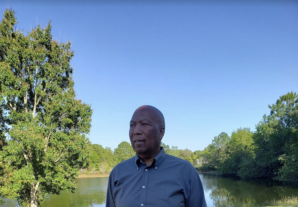 Keith Hamilton Standing in Front of a big Florida Lake